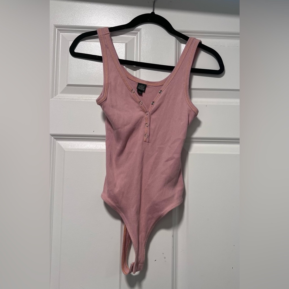 Pink body suit with orange stitching from wild fable, super stretchy!